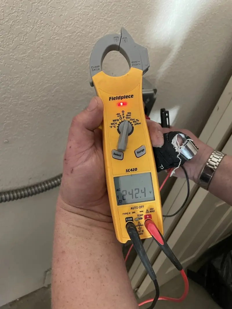 Voltage testing with clamp meter during Generator Installation in Valrico